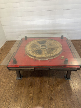 Unique industrial table made from a negative train wheel wooden mold - Really Old Shit