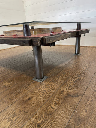 Unique industrial table made from a negative train wheel wooden mold - Really Old Shit