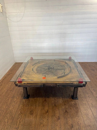 unique industrial table from negative train wheel wooden mold - Really Old Shit